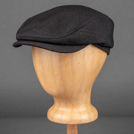Driver flat cap made of black selvedge virgin wool