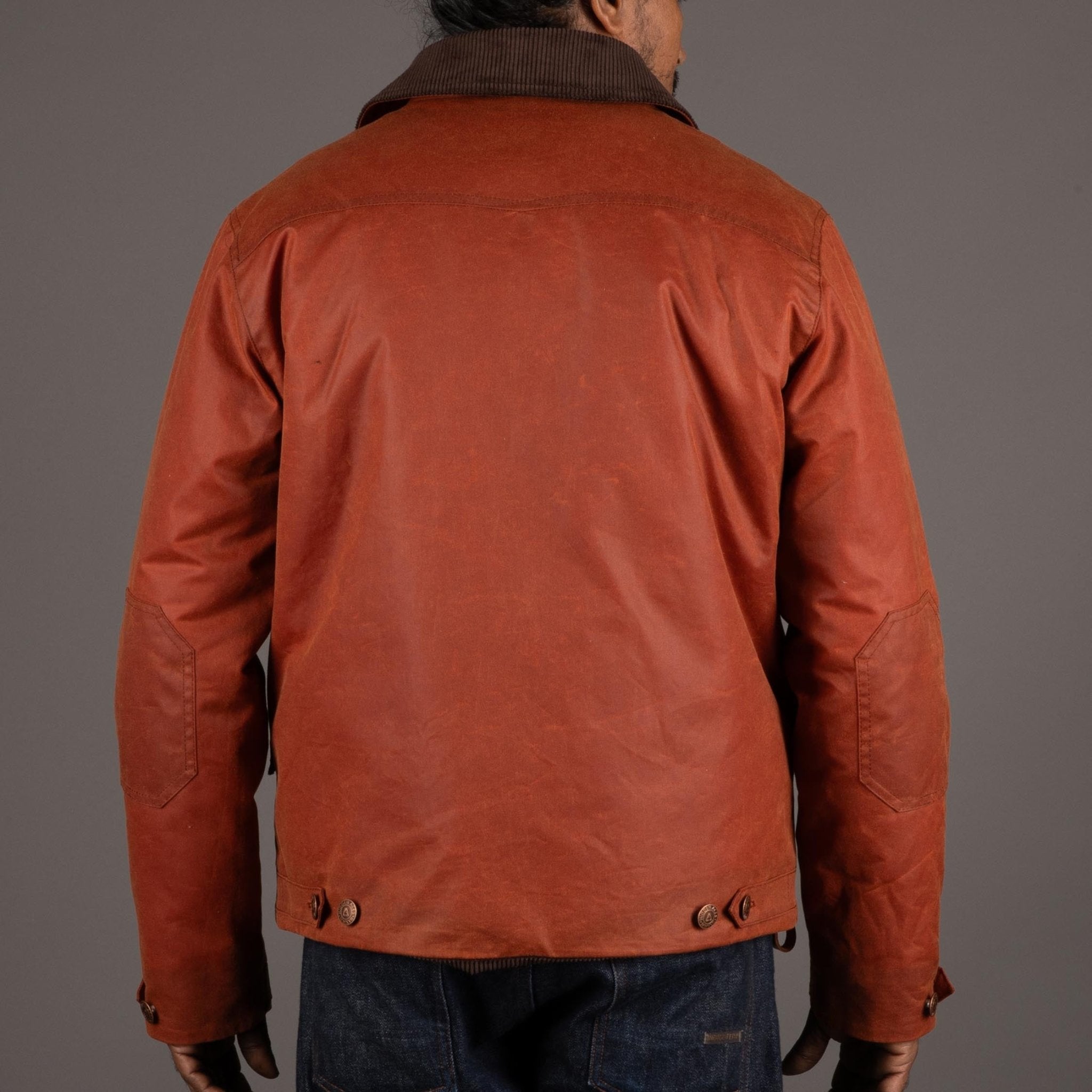 Hidden AcesPollux Padded Wachsjacke in Brick RedJackenBritish Parts Luzern