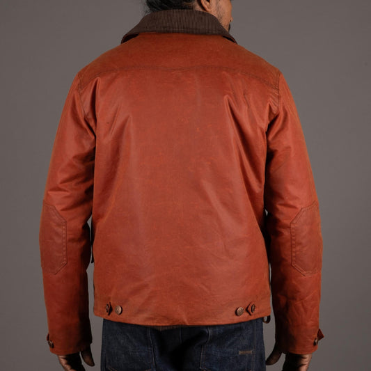 Hidden AcesPollux Padded Wachsjacke in Brick RedJackenBritish Parts Luzern