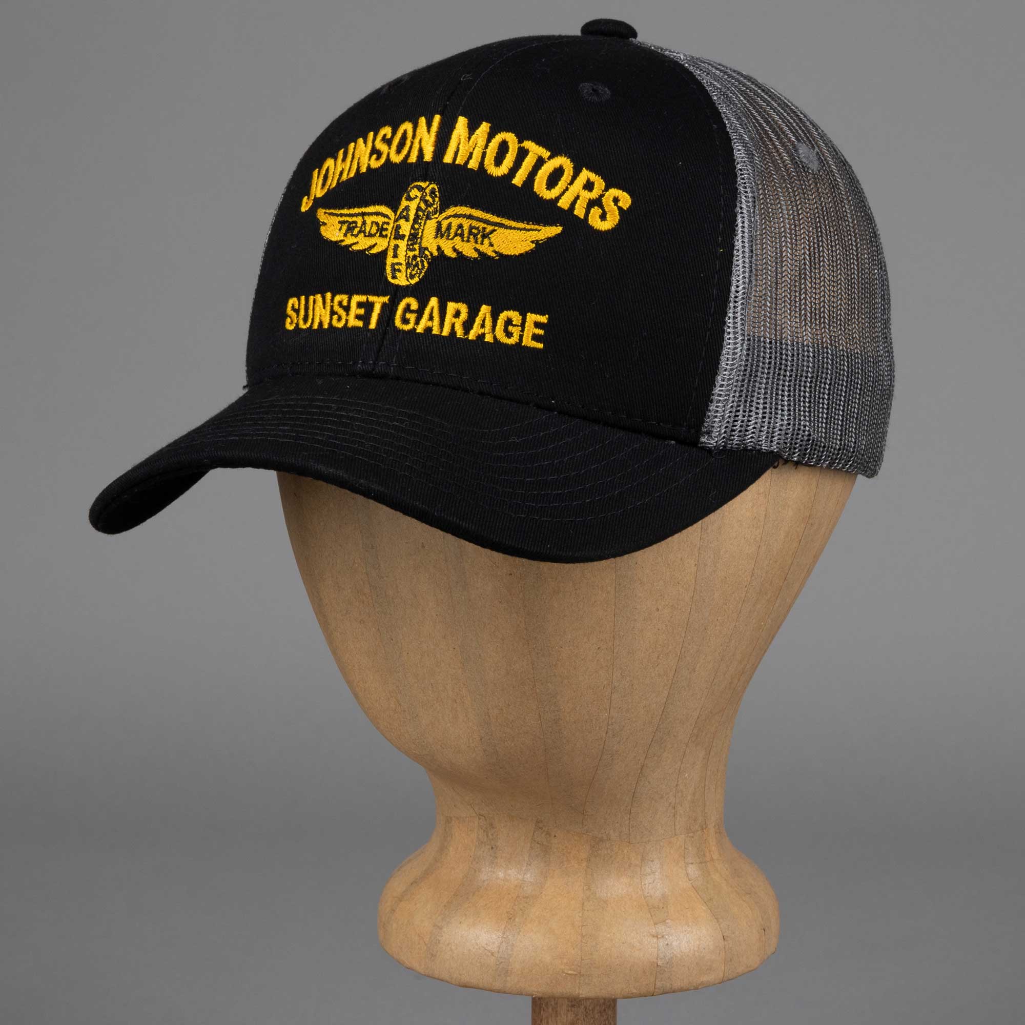 Johnson MotorsSunset Garage Cap schwarz / grauTrucker CapBritish Parts Luzern