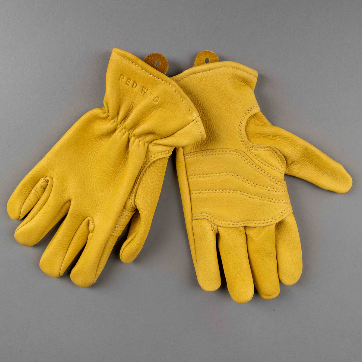 Unlined yellow leather gloves